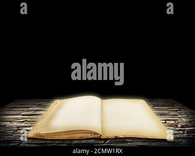 Old open book with blank pages on stone grunge background Stock Photo