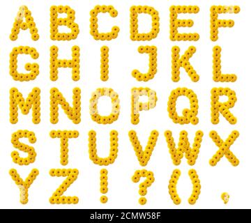 letters of the alphabet from yellow flowers isolated on white background Stock Photo