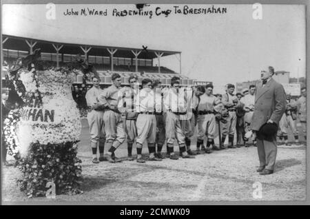 John Montgomery Ward presenting cup to Roger Bresnahan before New York NL players (baseball) Stock Photo