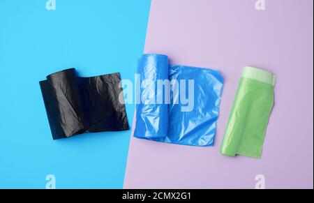 three rolled up rolls with plastic garbage bags Stock Photo