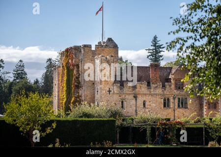 Hever Castle shot in the Summer of 2020 during the pandemic on a bright sunny day as flowers bloom around the beautiful grounds Stock Photo