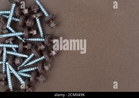 Tapping screws for mounting metal roof Stock Photo