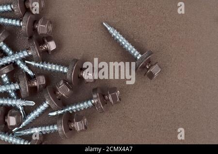 Tapping screws for mounting metal roof Stock Photo