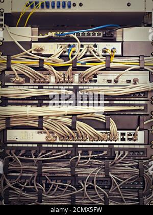 Patch Panel server rack with cords in different colors Stock Photo