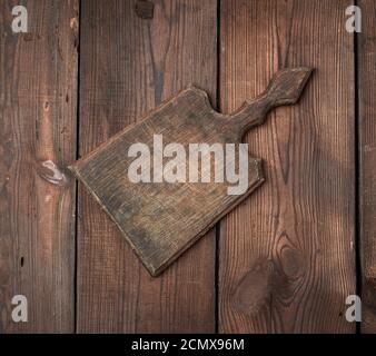 very old empty wooden rectangular cutting board Stock Photo