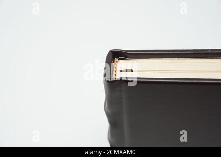 Top corner of Hogwarts Harry Potter blank notebook from Universal Studios souvenir shop on a bright white background. Stock Photo