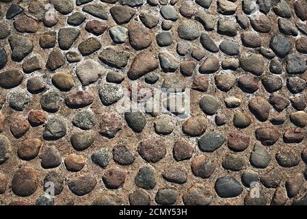 grunge old stone cobbles as a background Stock Photo