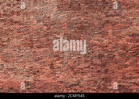 Old brick wall in grunge style as a background Stock Photo