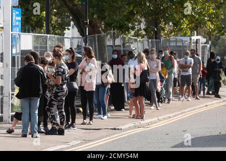 17th September 2020. Queues of people outside a walk-in Covid-19 testing centre Edmonton, North London. The UK government is considering rationing Coronavirus tests for the general public has seen an increased demand for Covid-19 tests  in recent days and a rise of over 3,500 daily.  Photo by Ray Tang/Ray Tang Media Stock Photo