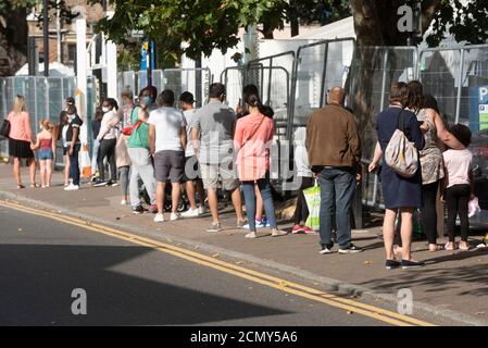 17th September 2020. Queues of people outside a walk-in Covid-19 testing centre Edmonton, North London. The UK government is considering rationing Coronavirus tests for the general public has seen an increased demand for Covid-19 tests  in recent days and a rise of over 3,500 daily.  Photo by Ray Tang/Ray Tang Media Stock Photo