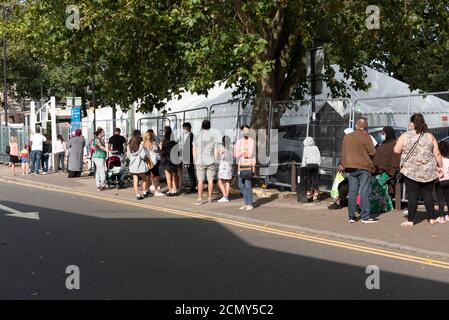 17th September 2020. Queues of people outside a walk-in Covid-19 testing centre Edmonton, North London. The UK government is considering rationing Coronavirus tests for the general public has seen an increased demand for Covid-19 tests  in recent days and a rise of over 3,500 daily.  Photo by Ray Tang/Ray Tang Media Stock Photo