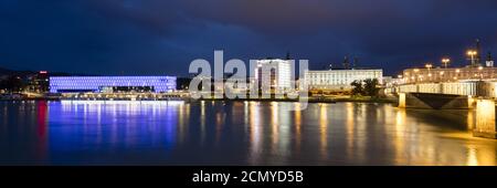 Lentos Art Museum at the bank of the Danube river by night, Linz, Upper Austria, Austria, Europe Stock Photo