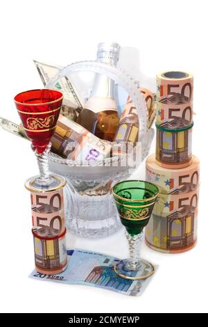 isolation on a white background, currency, closed the bottle and empty colored glasses Stock Photo