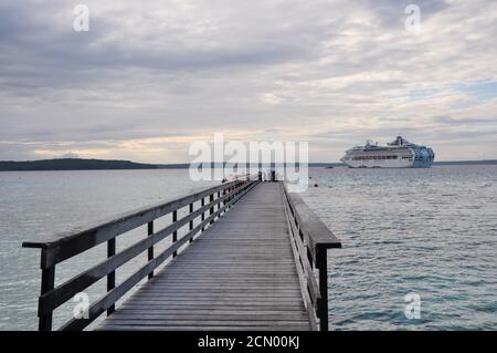 Sun Princess anchored off the island of Lifou Stock Photo