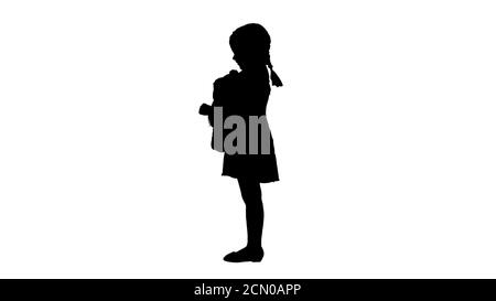 Silhouette Little girl in polka dot dress hugging teddy bear rea Stock Photo