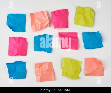 multicolored blank crumpled paper stickers of different sizes Stock Photo