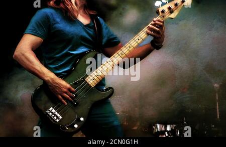 Guitarist on stage with light effects and grunge style. Close up with guitar. Young musician playing guitar, live musical background. Band playing on Stock Photo