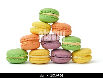 round baked multi-colored almond flour cakes macarons, dessert  on a white background Stock Photo
