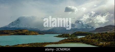 panoramic view of the mountains and turquoise color lakes, with small islands in the lakes. Stock Photo