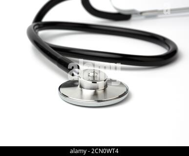 black metal medical stethoscope on a white background Stock Photo