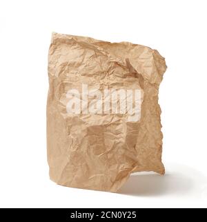 folded brown crumpled sheet of parchment paper isolated on white background Stock Photo
