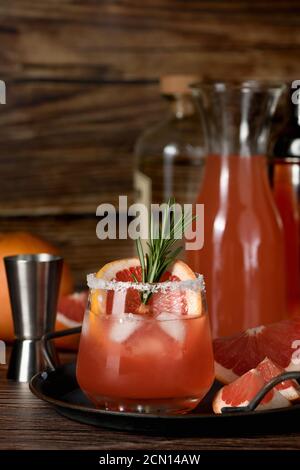 Cocktail tequila fresh grapefruit juice combined and rosemary. A festive drink is ideal for brunch,
