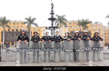 Police with shields in Lima, Peru Stock Photo