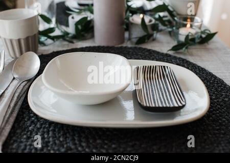 dinner plates on a romantic table setting for two Stock Photo