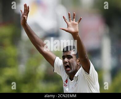 India's Ravichandran Ashwin appeals for an unsuccessful wicket of Sri Lanka Dinesh Chandimal (not pictured) during the first day of their first test cricket match in Galle, August 12, 2015. REUTERS/Dinuka Liyanawatte