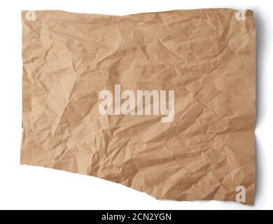 piece of crumpled brown paper isolated on white background, element for designer Stock Photo