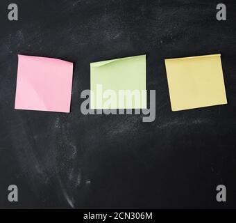 three blank paper multi-colored square stickers Stock Photo