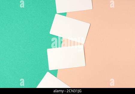 rectangular white blank business cards on a color background Stock Photo