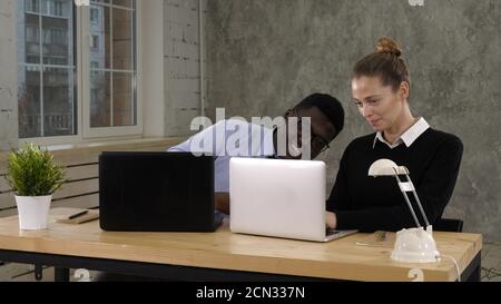 Two software developers working on a new project Stock Photo
