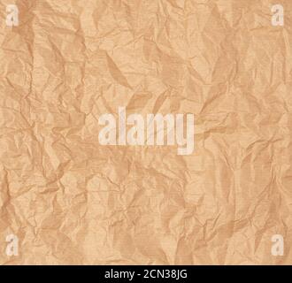 crumpled brown sheet of parchment paper Stock Photo