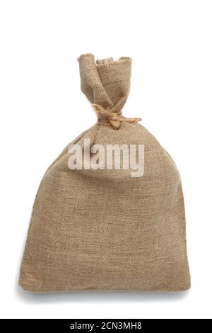 full canvas bag tied with rope and isolated on a white background Stock Photo