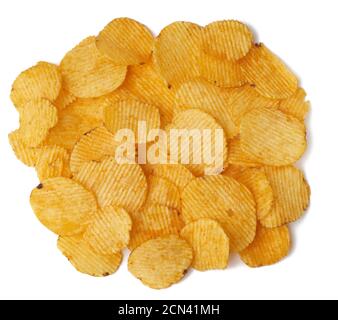 heap of corrugated round yellow fried potato chips isolated on white background Stock Photo