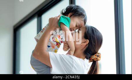 Portrait of Asia kid playing at home Stock Photo