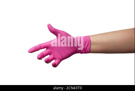 female hand in a pink latex glove is isolated on a white background Stock Photo