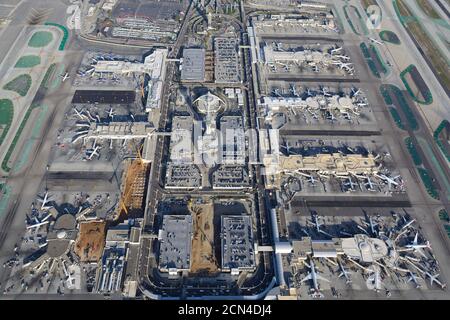 Los Angeles International Airport aerial view showing multiple terminals. Overview of LAX / KLAX Airport in CA, USA. World Way access road. Stock Photo