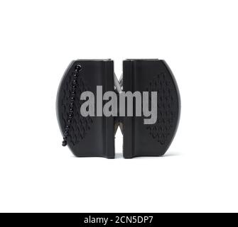 black plastic knife sharpener isolated on white background Stock Photo