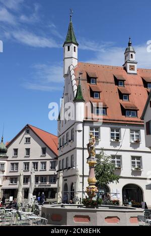Market fountain with knight figure, behind it the historic town hall in the old town, Biberach Stock Photo
