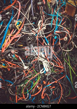 Old colorful mixed electric wires. Texture background wallpaper Stock