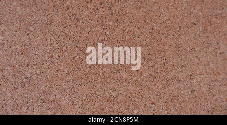 Brown cork wood background showing grain and mottled detail with copy space Stock Photo