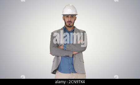 Confident construction engineer architect young man in helmet wi Stock Photo