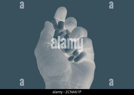 X-ray shot hand holding prescription pills Stock Photo