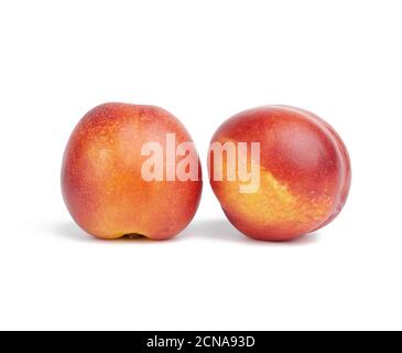 ripe round ripe nectarine isolated on white background, tasty and healthy fruit Stock Photo