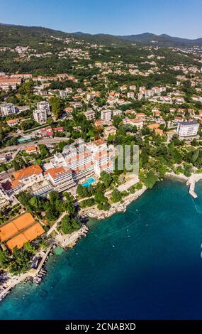 Beautiful panoramic view of Lovran village and its sea shore in Croatia. Top view photo taken on drone. Stock Photo