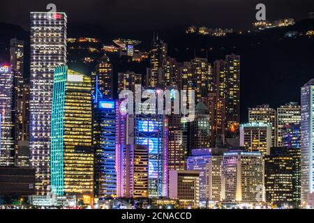 Hong Kong night view seen from the Victoria Harbor Stock Photo