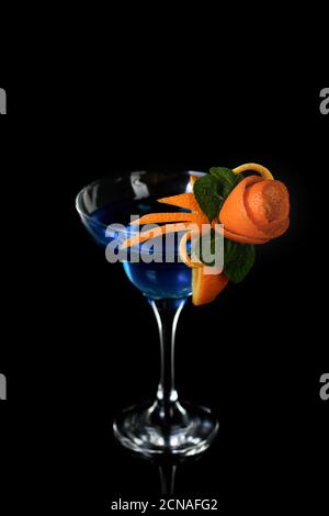 Art in orange- fruits carving. How to make to citrus garnish design for a drink. Stock Photo