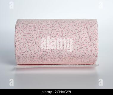 twisted roll of white paper towel on a white background Stock Photo
